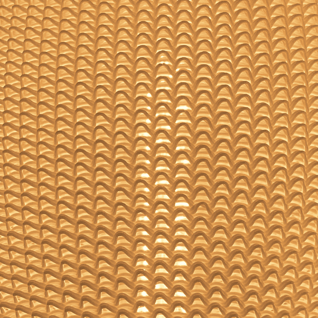 Close-up of the OLIVA lampshade: light shining through the tiny arches of the mesh