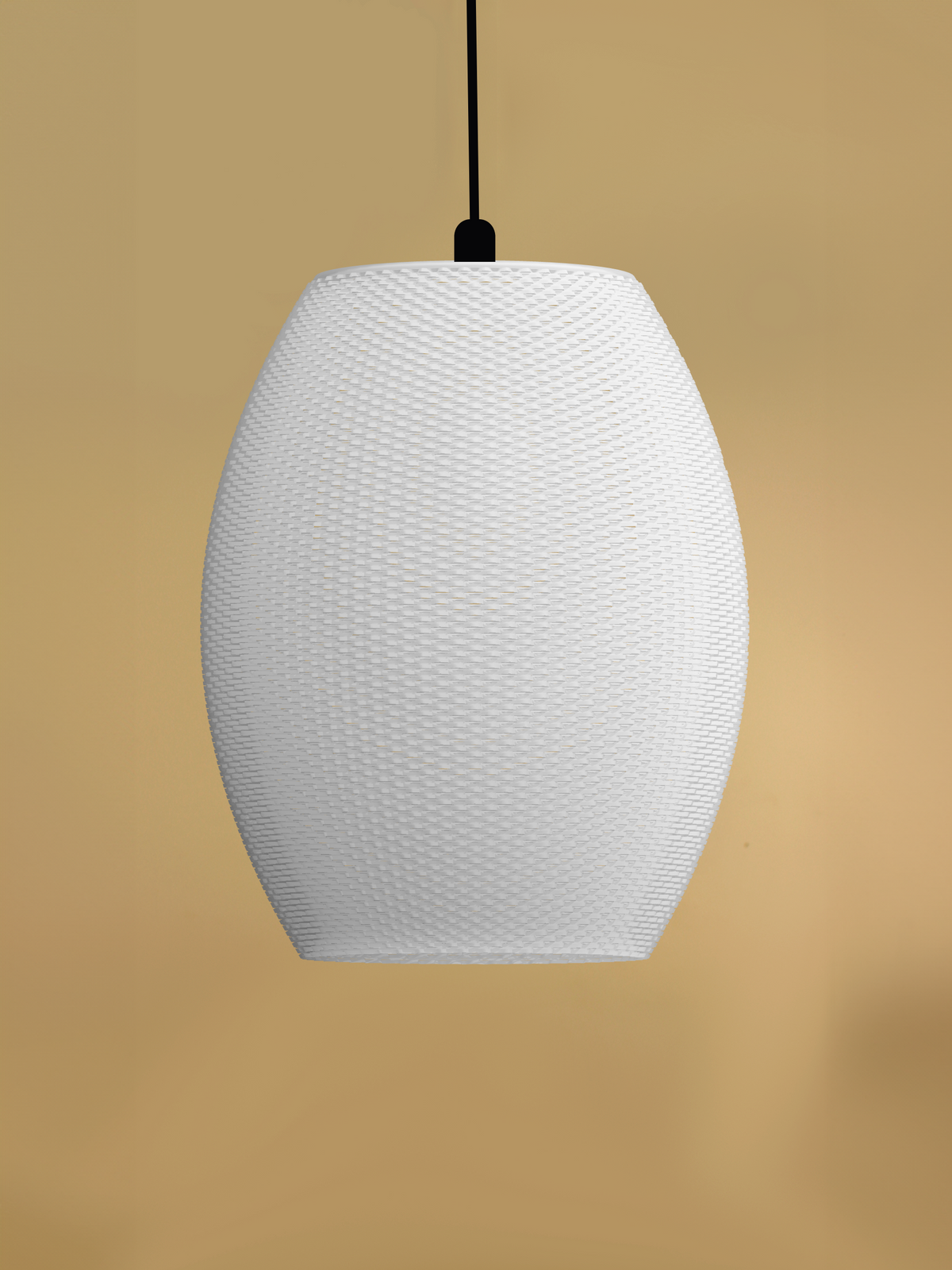 OLIVA lampshade in white: rounded oval shape with a fine knit-like mesh, hanging from a black cord